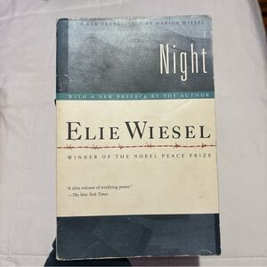 Night by Elie Wiesel - Paperback Novel in Blue & Cream book